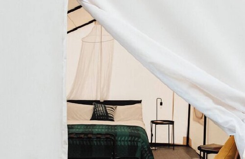 Canoncito Alquiler De RV | 2 Person Glamping tent with one Queen Bed @ Field Trip NM .