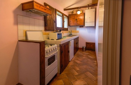 Asciano Otro | Apartamento de 2 habitaciones en el primer piso con aire acondicionado y jardín.
