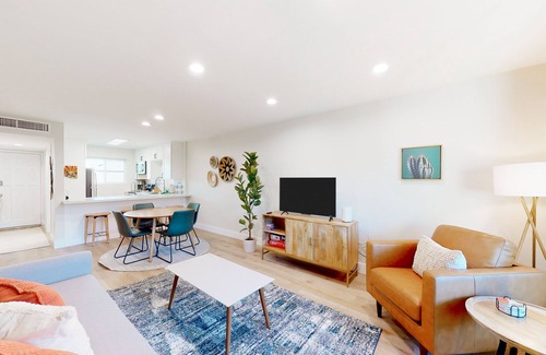 Fashion Square Condominio | 2-story dog-friendly condo with patio, outdoor pool, W/D, streaming, partial AC
