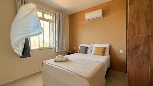 Porto das Dunas Apartamento | 2 suítes temporada - VENTILADO E NASCENTE, condomínio tranquilo com PISCINA, CHURRASQUEIRA E PLAYGROUND I Cozinha completa, estacionamento coberto, home office I Ideal para FAMÍLIAS E CASAIS I Prox do BEACH PARQUE e PRAIA - Porto das Dunas - CE