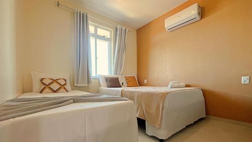 Porto das Dunas Apartamento | 2 suítes temporada - VENTILADO E NASCENTE, condomínio tranquilo com PISCINA, CHURRASQUEIRA E PLAYGROUND I Cozinha completa, estacionamento coberto, home office I Ideal para FAMÍLIAS E CASAIS I Prox do BEACH PARQUE e PRAIA - Porto das Dunas - CE