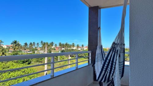 Porto das Dunas Apartamento | 2 suítes temporada - VENTILADO E NASCENTE, condomínio tranquilo com PISCINA, CHURRASQUEIRA E PLAYGROUND I Cozinha completa, estacionamento coberto, home office I Ideal para FAMÍLIAS E CASAIS I Prox do BEACH PARQUE e PRAIA - Porto das Dunas - CE