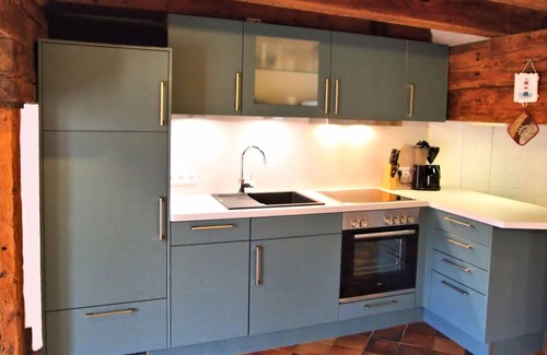 Kreitlapperei Casa | 200 year old windmill as a vacation home near Greetsiel. Pet friendly!