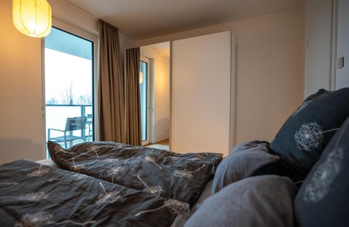 Innenhafen Apartamento | 210 Fewo Langeoog mit Balkon und Meerblick sowie Seeblick