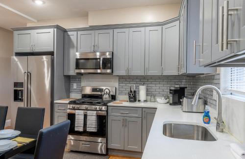 Dudley - Brunswick King Apartamento | 233-1 4BR Boston - Cozy Apt near MBTA Station