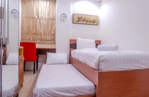 Bangka Apartamento | 2BR Apartment Cozy Pool View Kemang Village with Access to Mall By Travelio