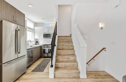 Minor Casa | 2BR Townhome w/ City Skyline Views & Easy Parking!