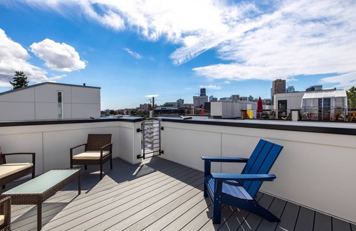 Minor Casa | 2BR Townhome w/ City Skyline Views & Easy Parking!