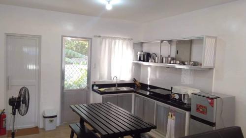 Nasugbu Casa | 2BR townhouses good for 12pax each & NETFLIX & 100Mbps WIFI & pool resort 2min walk & 3km outside Pico de Loro Cove & Calayo Cove - with Endorsement for Pico de Loro Cove good for 7 days & Boat-Tour & Island Hopping assistance