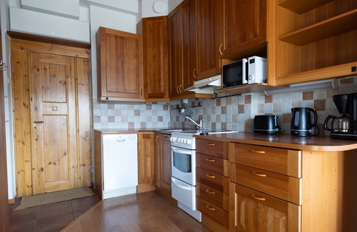 Etu-Toolo Apartamento | 2ndhomes 2-Story Penthouse w Balcony
