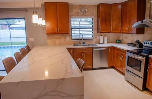 Coral Heights Casa | 3/2 home, Saltwater Heated Pool/5-min to bch/Pet