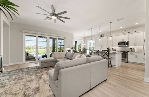Okahumpka Casa | 3/2 Premier POOL Home w/ GOLF CART in The Village of Lake Denham