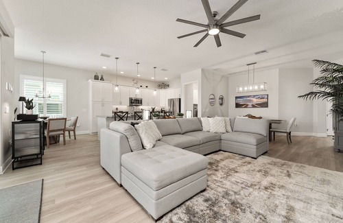 Okahumpka Casa | 3/2 Premier POOL Home w/ GOLF CART in The Village of Lake Denham