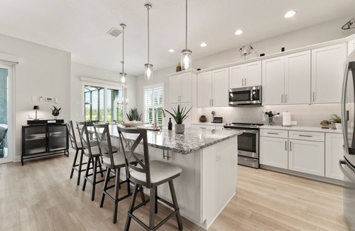 Okahumpka Casa | 3/2 Premier POOL Home w/ GOLF CART in The Village of Lake Denham