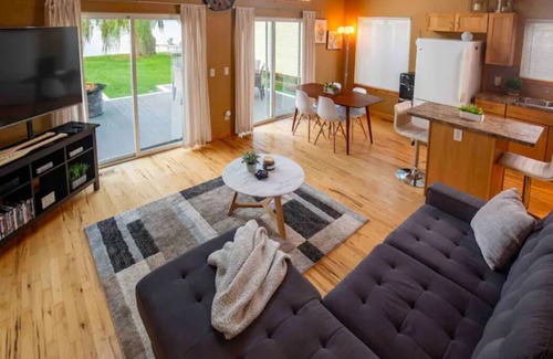 Houghton Lake Casa | 3 Beds with Dock, Hoist, and 40 ft of Waterfront!