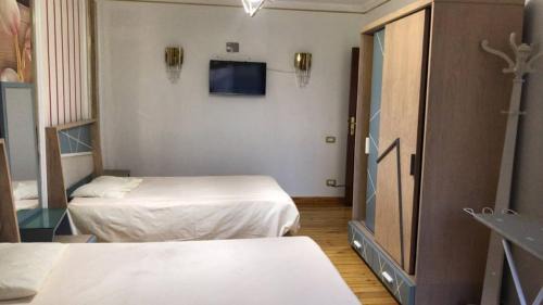 Al Duqqi Apartamento | 3-bedroom hotel apartment in Dokki, a distinctive accommodation, minutes to Zamalek