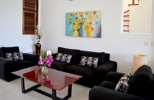 Playa Chahué Condominio | Casa Elisa: Penthouse de lujo de 3 dormitorios frente al mar con gran terraza en la azotea y vistas de 360 °