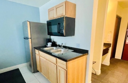 Cuero Casa | 3 Double Queen With Kitchenette at FairBridge Inn & Suites Cuero, Pet-Friendly!