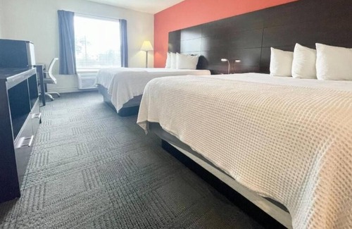 Cuero Casa | 3 Double Queen With Kitchenette at FairBridge Inn & Suites Cuero, Pet-Friendly!