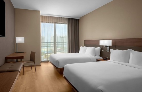Clearwater Beach Hotel | 3 Elegant Rooms Perfect for Relaxation with Rooftop Pool and Poolside Lounger