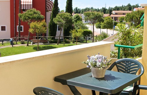 Aprilia Marittima Apartamento | 3-Zi. Apartamento con jardín, Lignano / Aprilia Marittima, piscina, aire acondicionado, se admiten perros