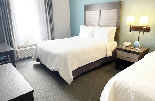 West Kissimmee Hotel | 3 Spacious Rooms w/ Free Breakfast & Pools Access | Resort Near Universal Studio