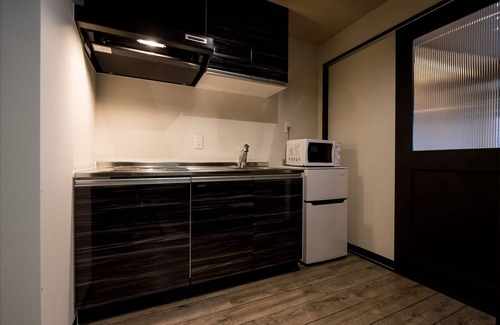 Shimabuku Apartamento | # 305: espacio para relajarse en su especificación habitación de hotel - 305 / Nakagami-gun, Prefectura de Okinawa