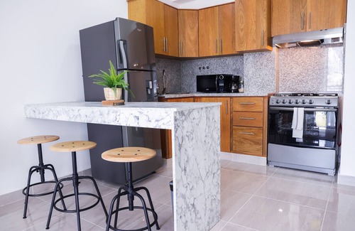 Ensanche Quisqueya Apartamento | Departamento moderno con jacuzzi y gym