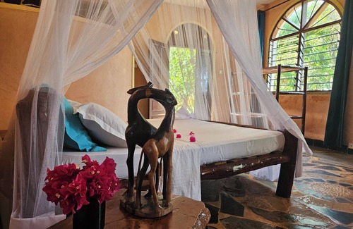 Shimoni Casa | Turtle Suite de 38 m2 en una villa de 560 m2, vista al océano Índico