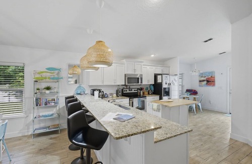 Palm Coast Casa | 3BR Coastal Home + Heated Pool, Golf Cart & Bikes