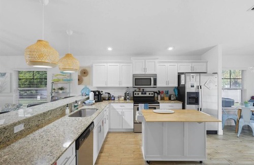 Palm Coast Casa | 3BR Coastal Home + Heated Pool, Golf Cart & Bikes