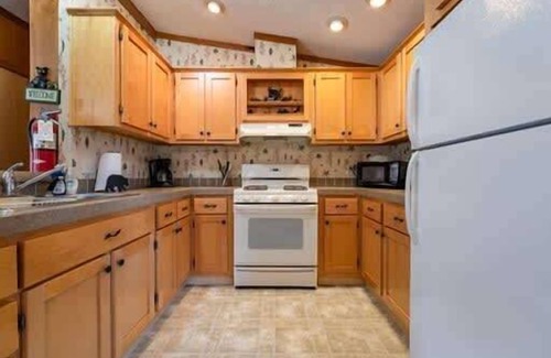 Neillsville Cabina | A short walk outside your cabin you can enjoy a great meal and at the Riviera Pub and Grill