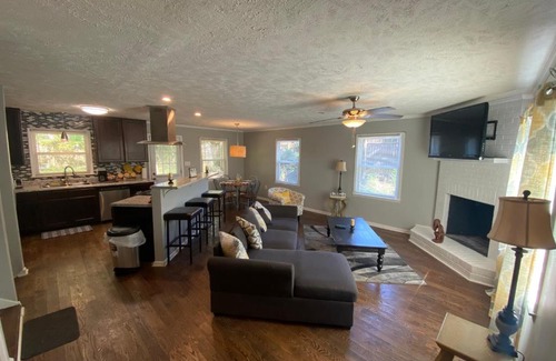 Terry Sanford Casa | 4-bedroom brick home with a full kitchen, king size bed and all the space you need for you and your large family on your getaway.