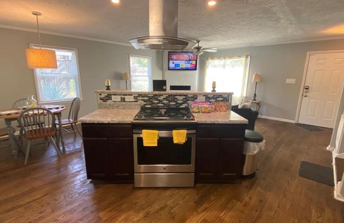 Terry Sanford Casa | 4-bedroom brick home with a full kitchen, king size bed and all the space you need for you and your large family on your getaway.