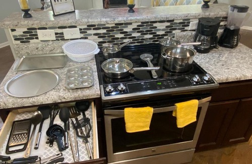 Terry Sanford Casa | 4-bedroom brick home with a full kitchen, king size bed and all the space you need for you and your large family on your getaway.
