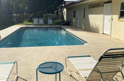 Coral Springs Casa | 4-Bedroom Cozy Home With a Resort Style Pool