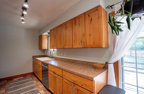 Lander Casa | 4-Bedroom Home with Fenced Backyard