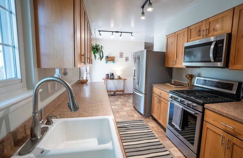 Lander Casa | 4-Bedroom Home with Fenced Backyard