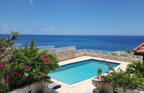 Pelican Key Villa | Villa privada de lujo Pelican Key con vista panorámica del mar Caribe
