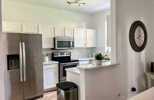 Wellington Casa | 4-bedroom townhome in tranquil Davenport minutes from Disney Parks!