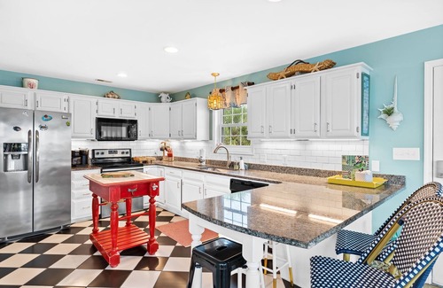 Ocean Isle Beach Casa | 4 Bedroom! Walk to Beach, Restaurants and Park! Boat Dock! VEIWS and SUNSETS!