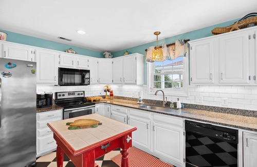 Ocean Isle Beach Casa | 4 Bedroom! Walk to Beach, Restaurants and Park! Boat Dock! VEIWS and SUNSETS!