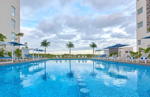 Benito Juárez Hotel | 4 Kitchenette Suite + Pool, Gym & Continental Breakfast, Close to CUN Airport