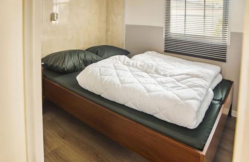Oisterwijk Apartamento | 4 persons chalet Valkenbosch situated in the forested area