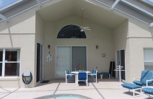 Eagle Pointe South Casa | 5 dormitorios, 4 baños, villa de 2 pisos, 10 minutos a Disney, frente al lago, pesca, piscina climatizada, WiFi