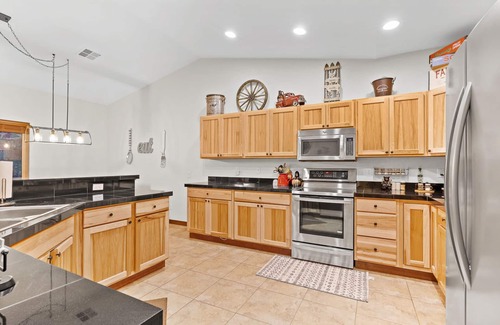 Ronald Casa | 5-star family home with game room, private hot tub, summer pool, near the lake!