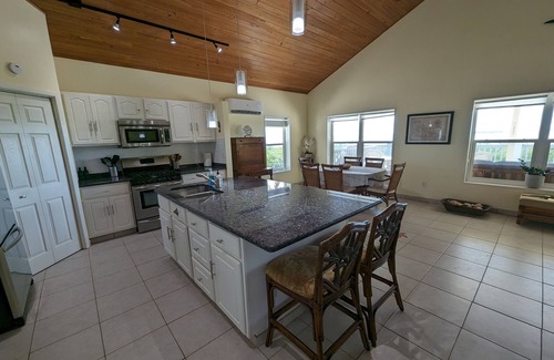 Cherokee Casa | 5 Star Waterfront Villa, Beach, Dock & Boat Rental