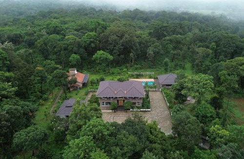 Virajpet Villa | 5BR Coffee & Mist Luxury Villa- Comp Breakfast, Pvt Pool, and Coffee Estate by StayVista