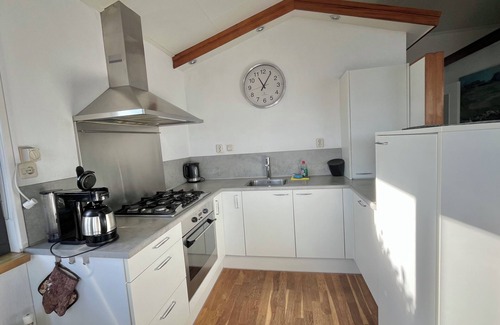 Anjum Casa | 6 personas frente al mar Lauwersmeer, casa totalmente equipada y moderna con sauna
