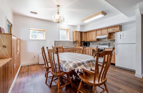 Minden Hills Cabaña | 7 bedrooms, 2 kitchens, large deck overlooking lakefront cottage. Max 14 persons